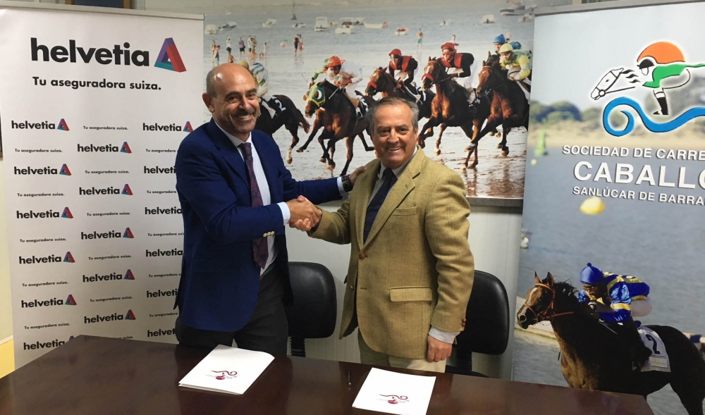 Firma convenio Helvetia